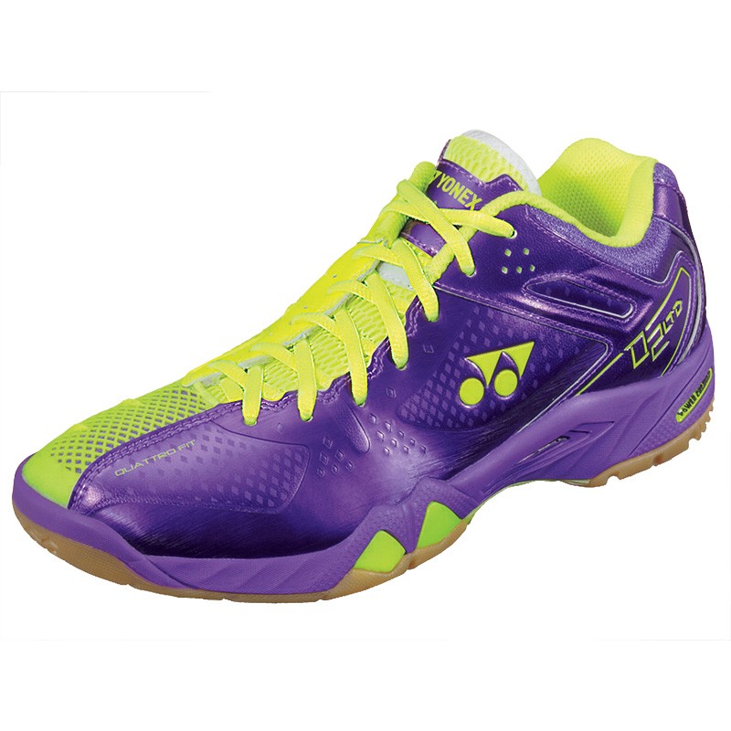 purple and yellow tennis shoes